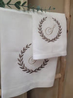 Coppia di asciugamani in puro lino con punto a giorno