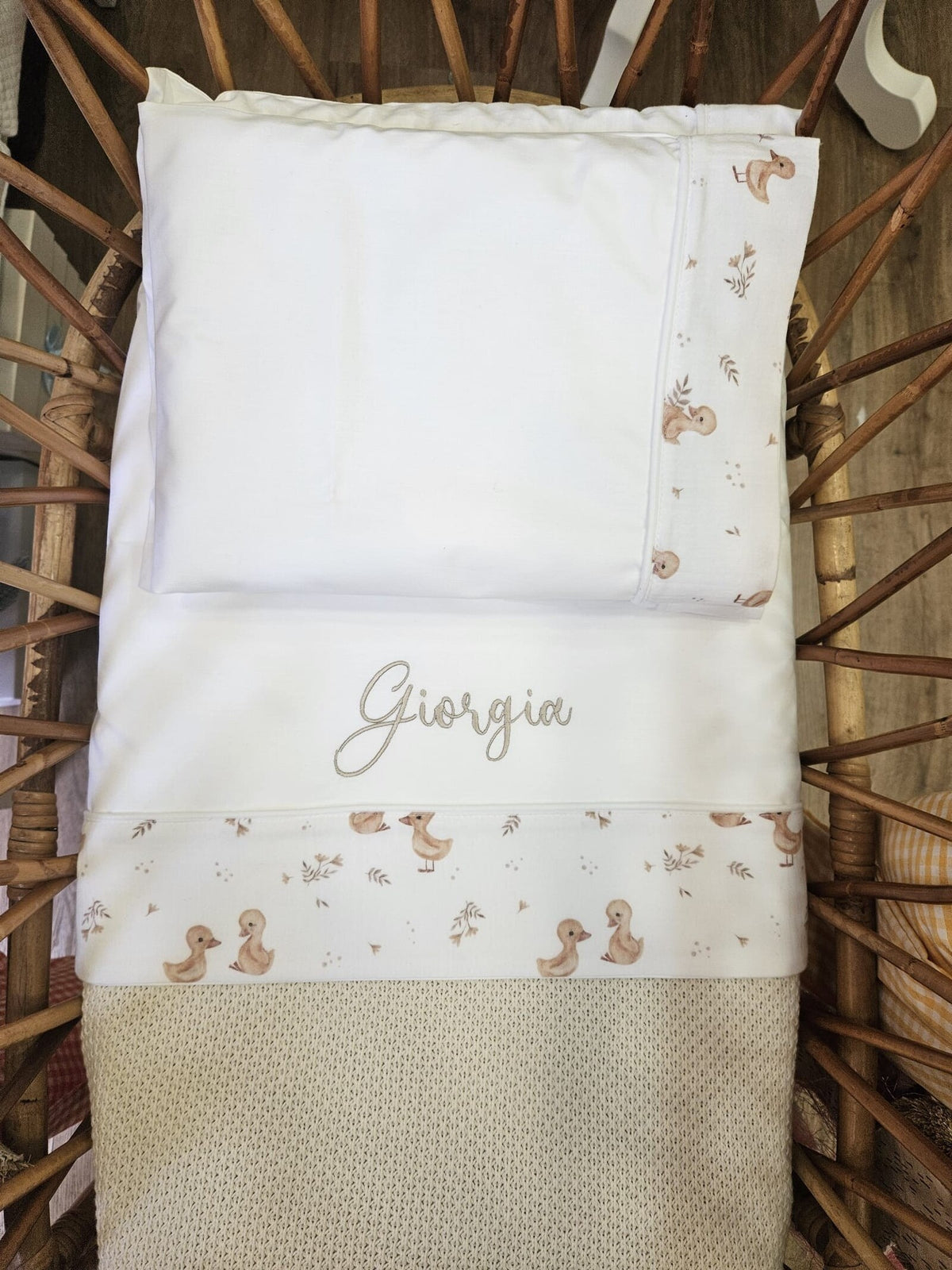 Lenzuolino con fascia a fantasia