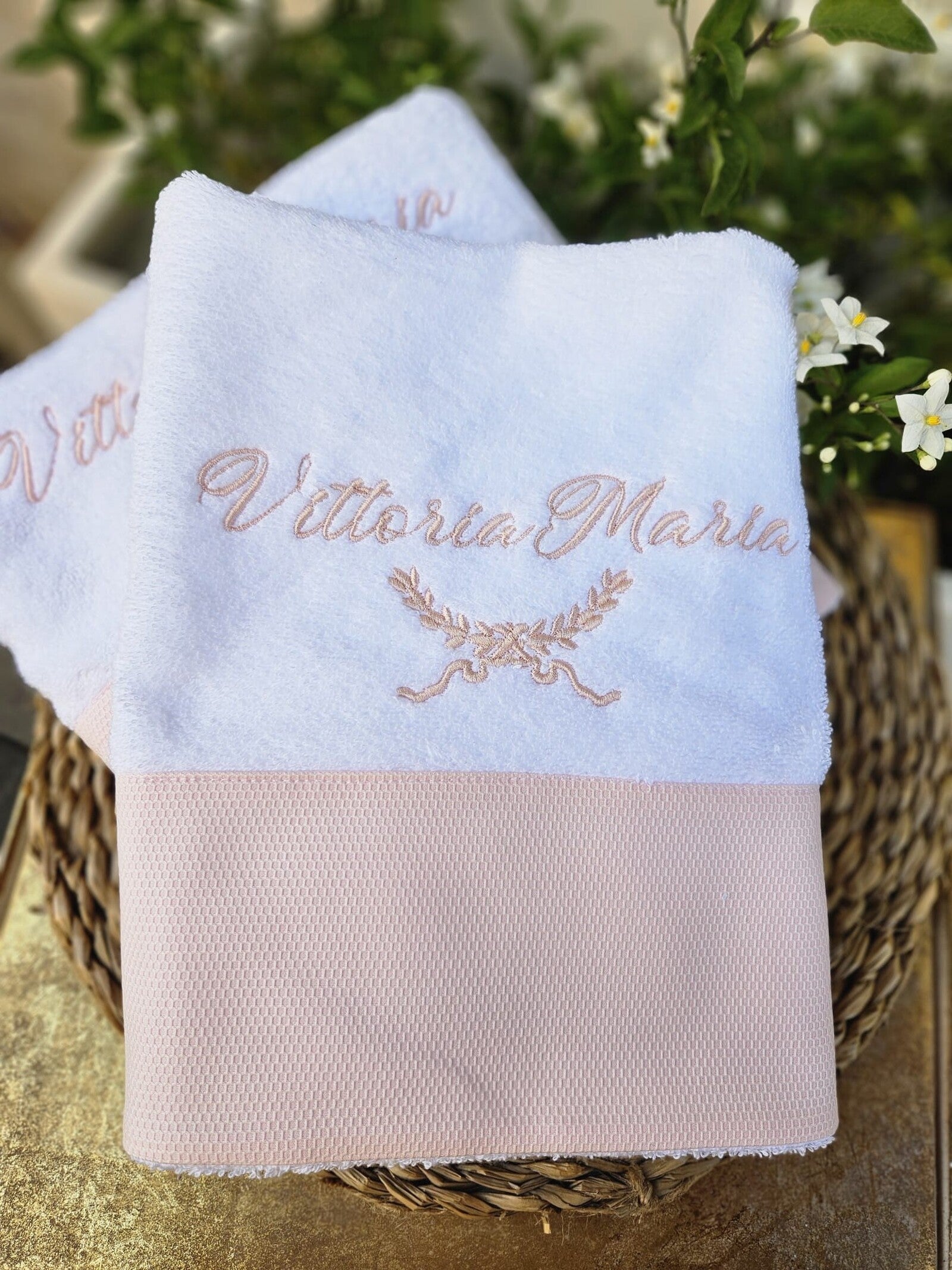 Coppia di asciugamani Baby Love in spugna e piquè nido d'ape