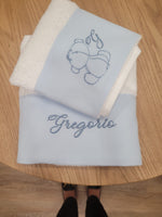 Coppia di asciugamani Baby Love in spugna e piquè nido d'ape