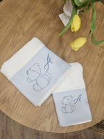 Coppia di asciugamani Baby Love in spugna e piquè nido d'ape