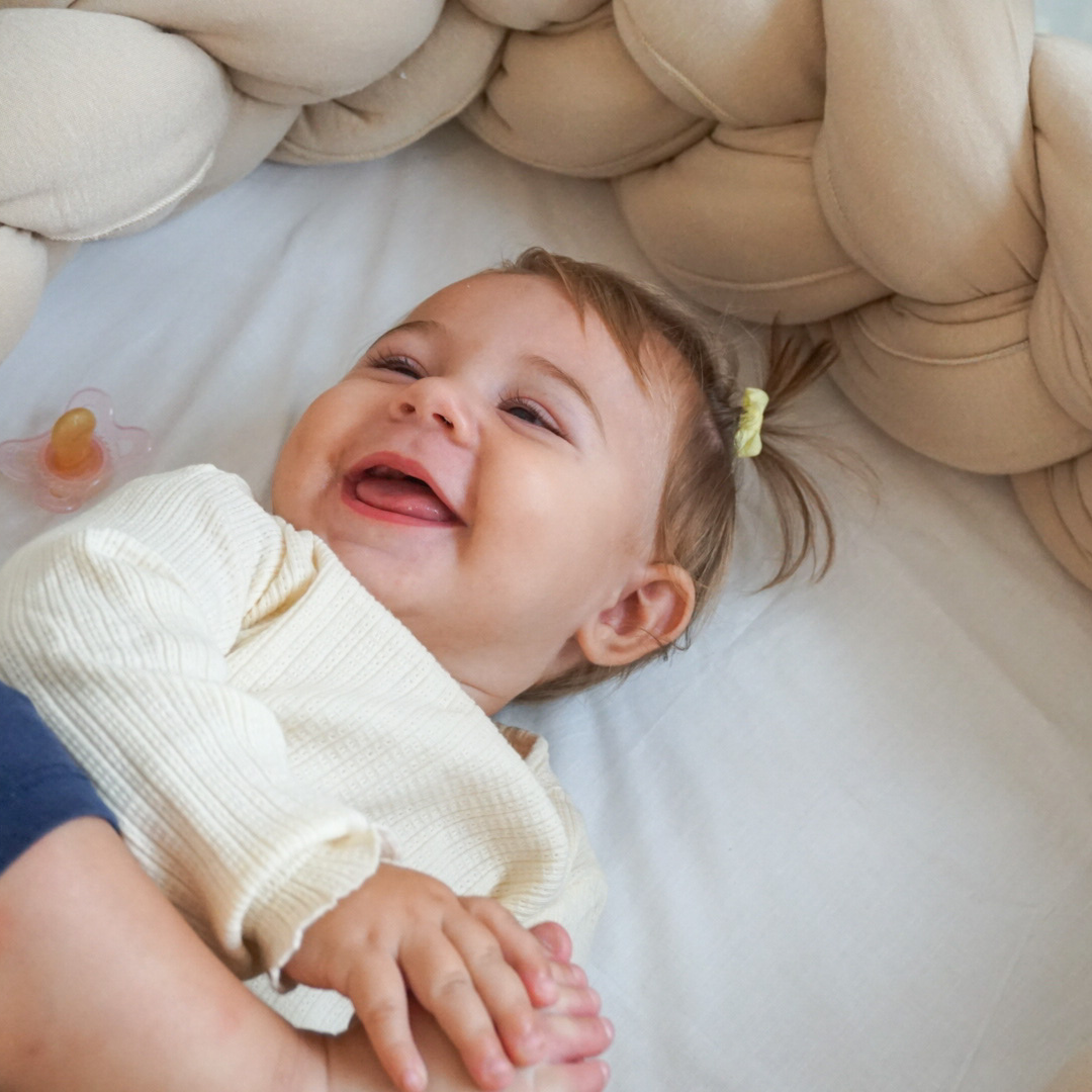 Treccia in cotone organico, riduttore per culla