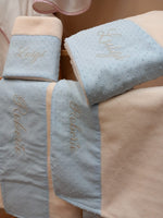 Coppia di asciugamani in spugna di bamboo e plumetis