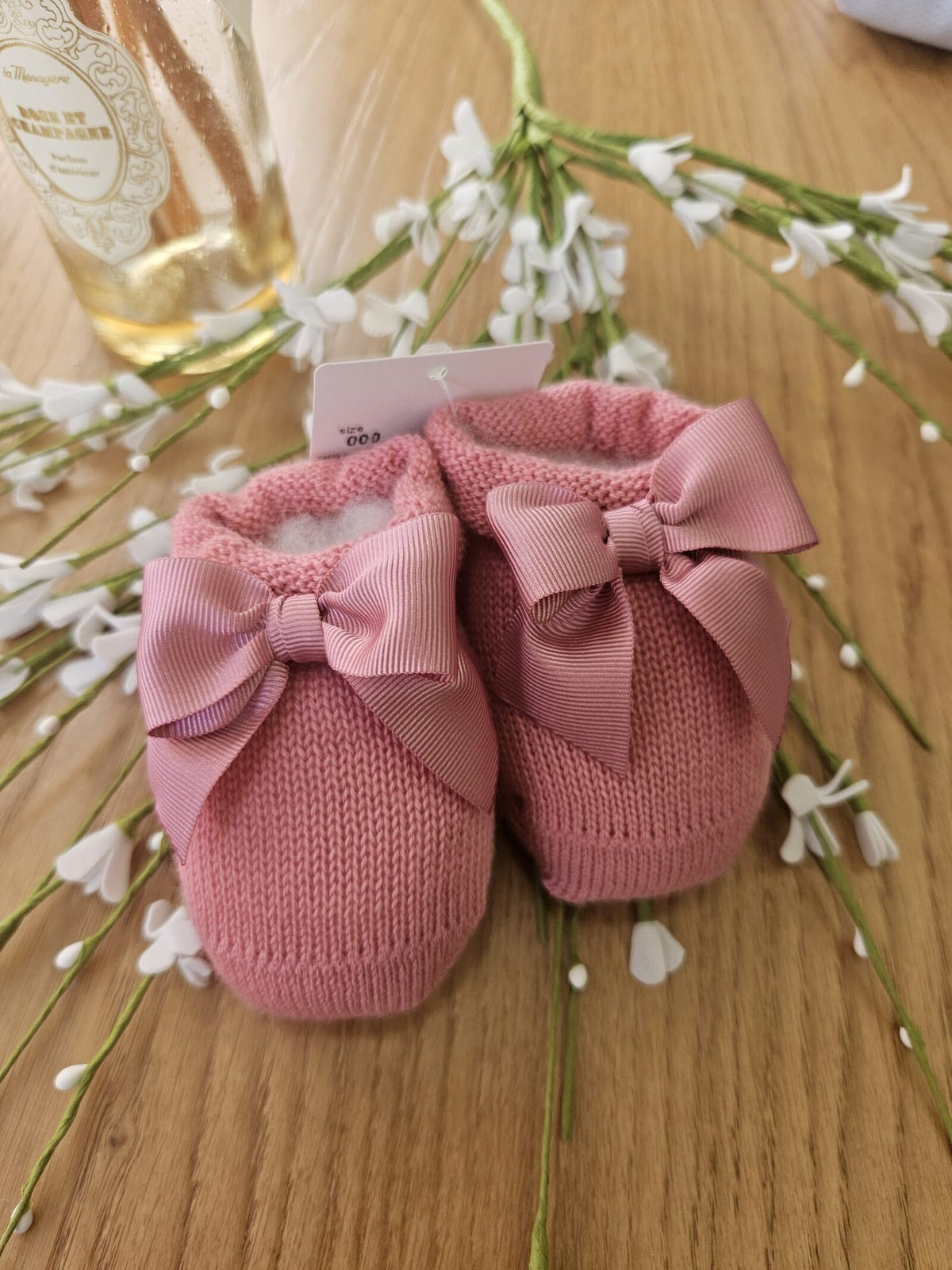 Scarpine neonato in lana con fiocco in gros grain