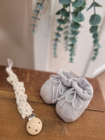 Scarpine neonato in lana con laccetti