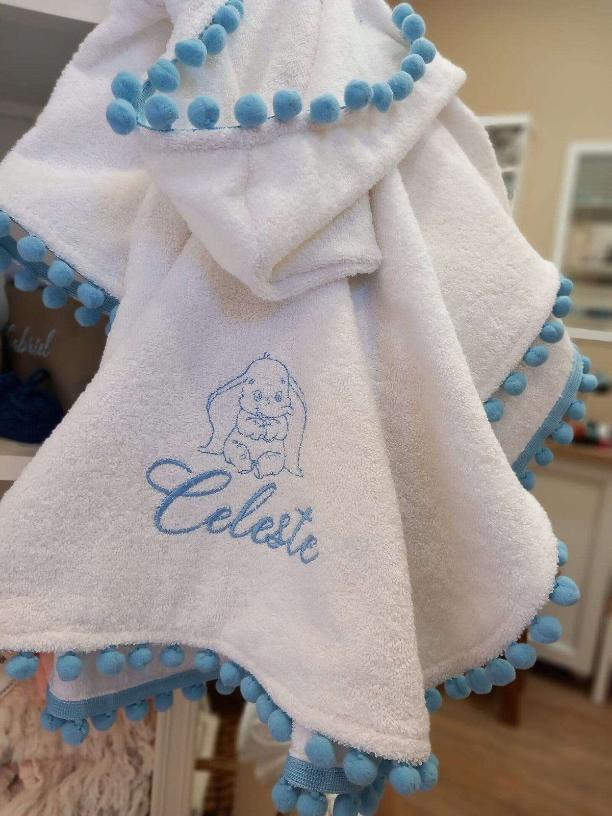 Accappatoio poncho in spugna di cotone e pon pon