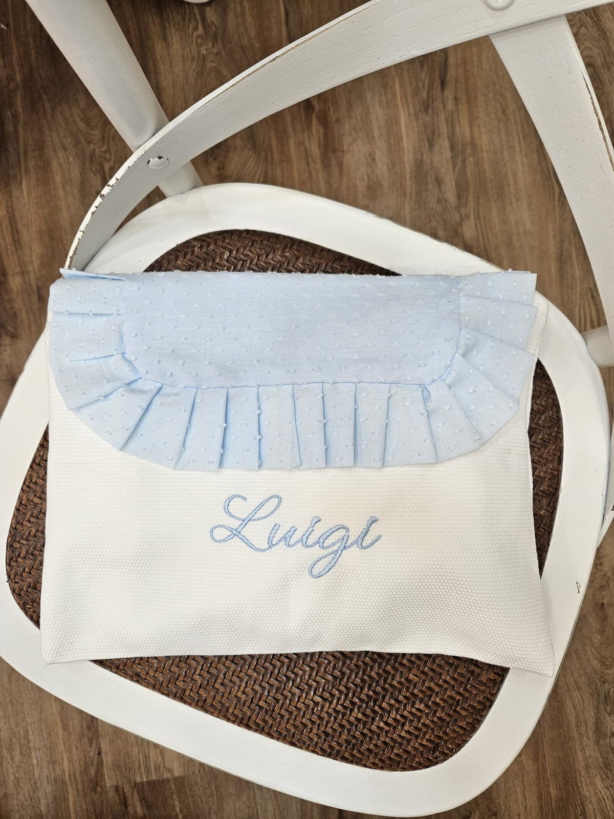 Busta nascita con pattina e rouche in plumetis