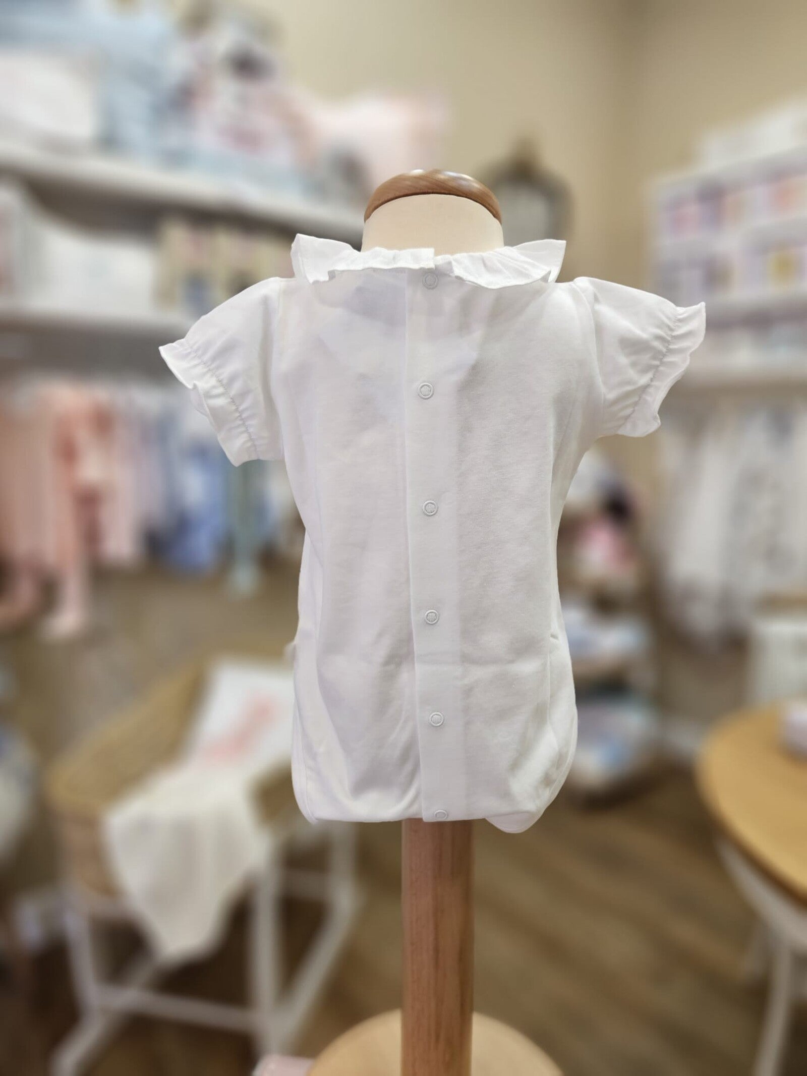 Body mezza manica con colletto a rouche