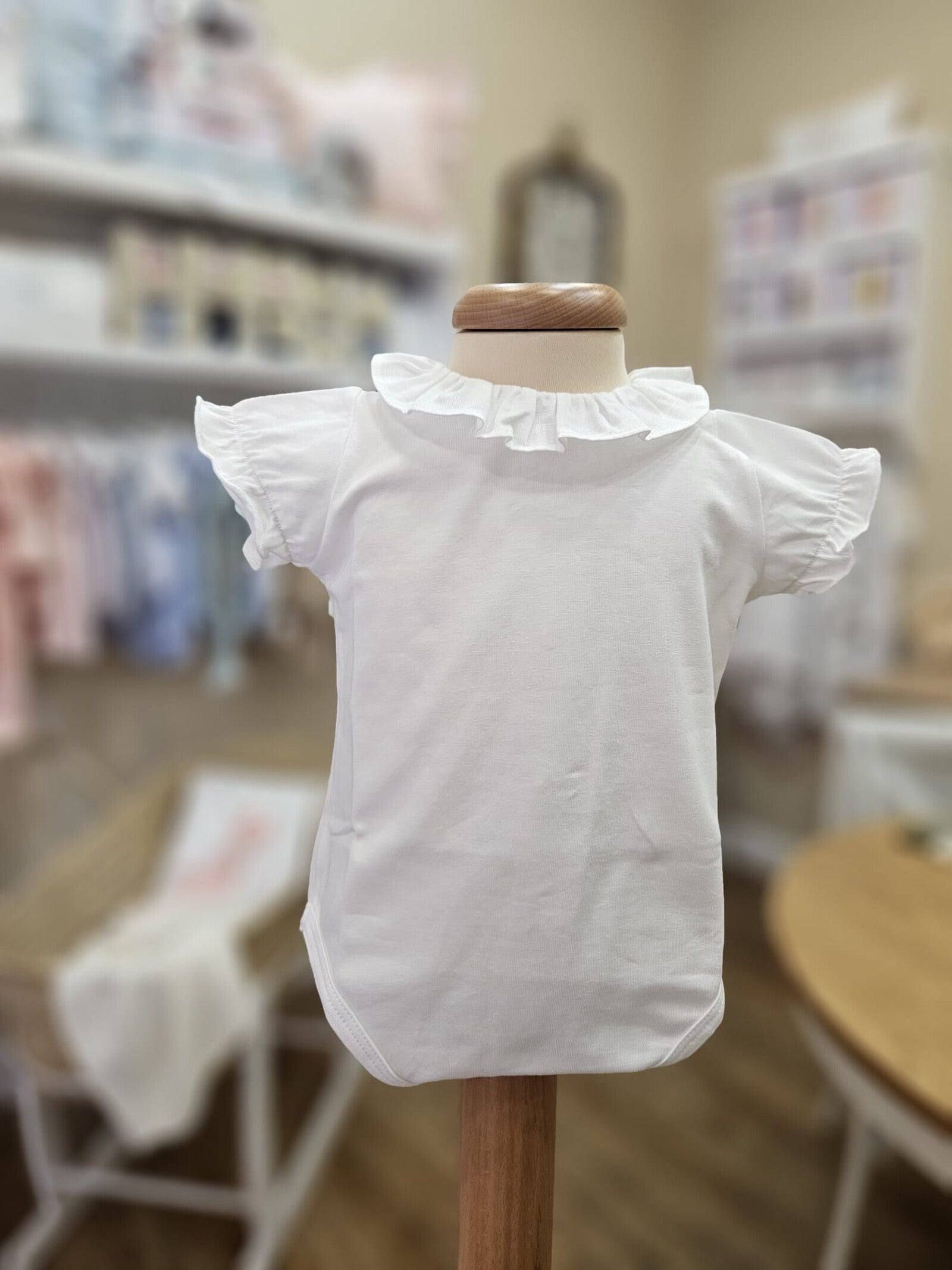 Body mezza manica con colletto a rouche