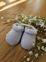 Scarpine neonato in lana con bottoncini al lato