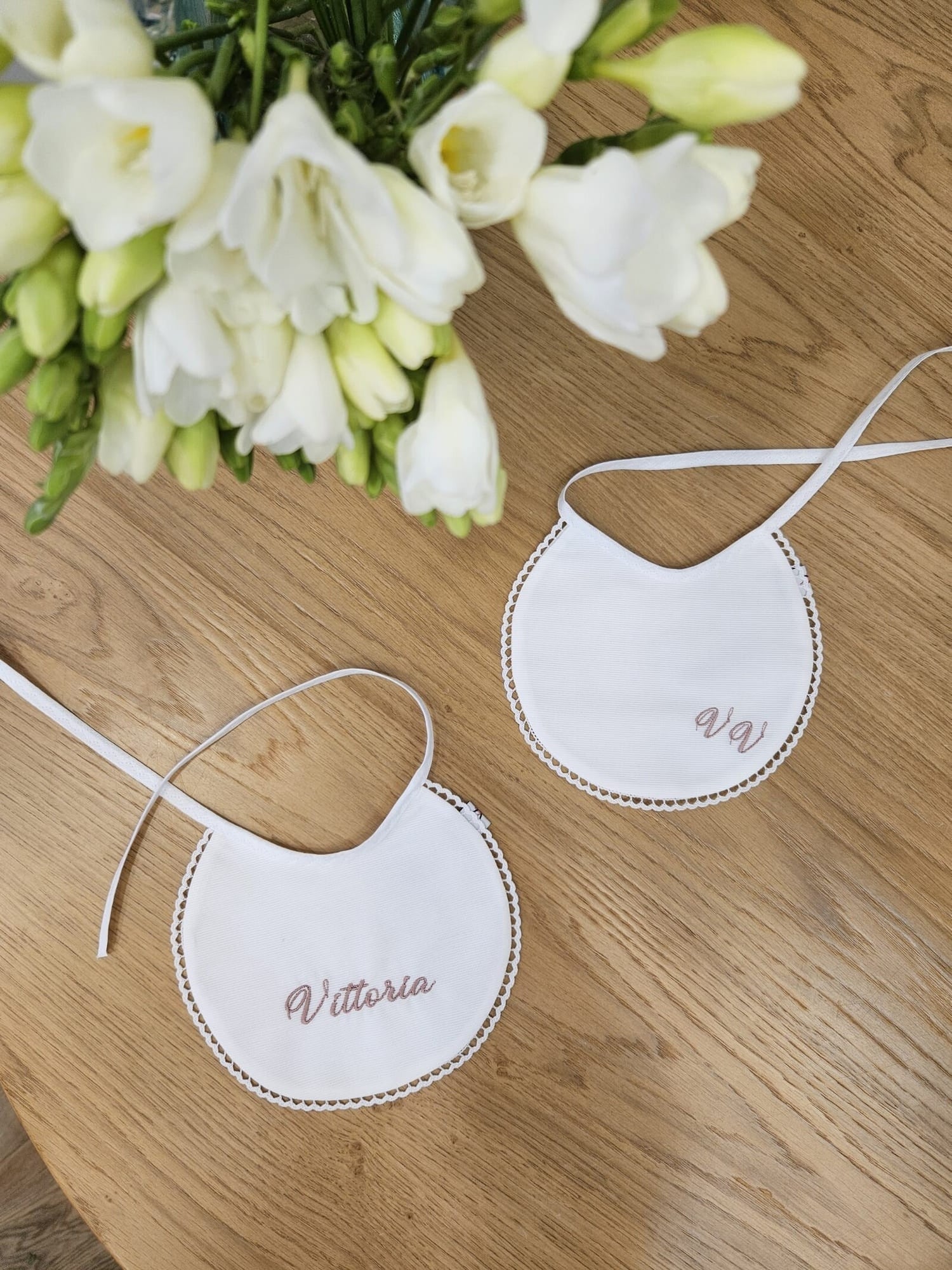 Coppia di bavaglini in piquè di cotone