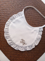 Bavaglino con rouche in plumetis