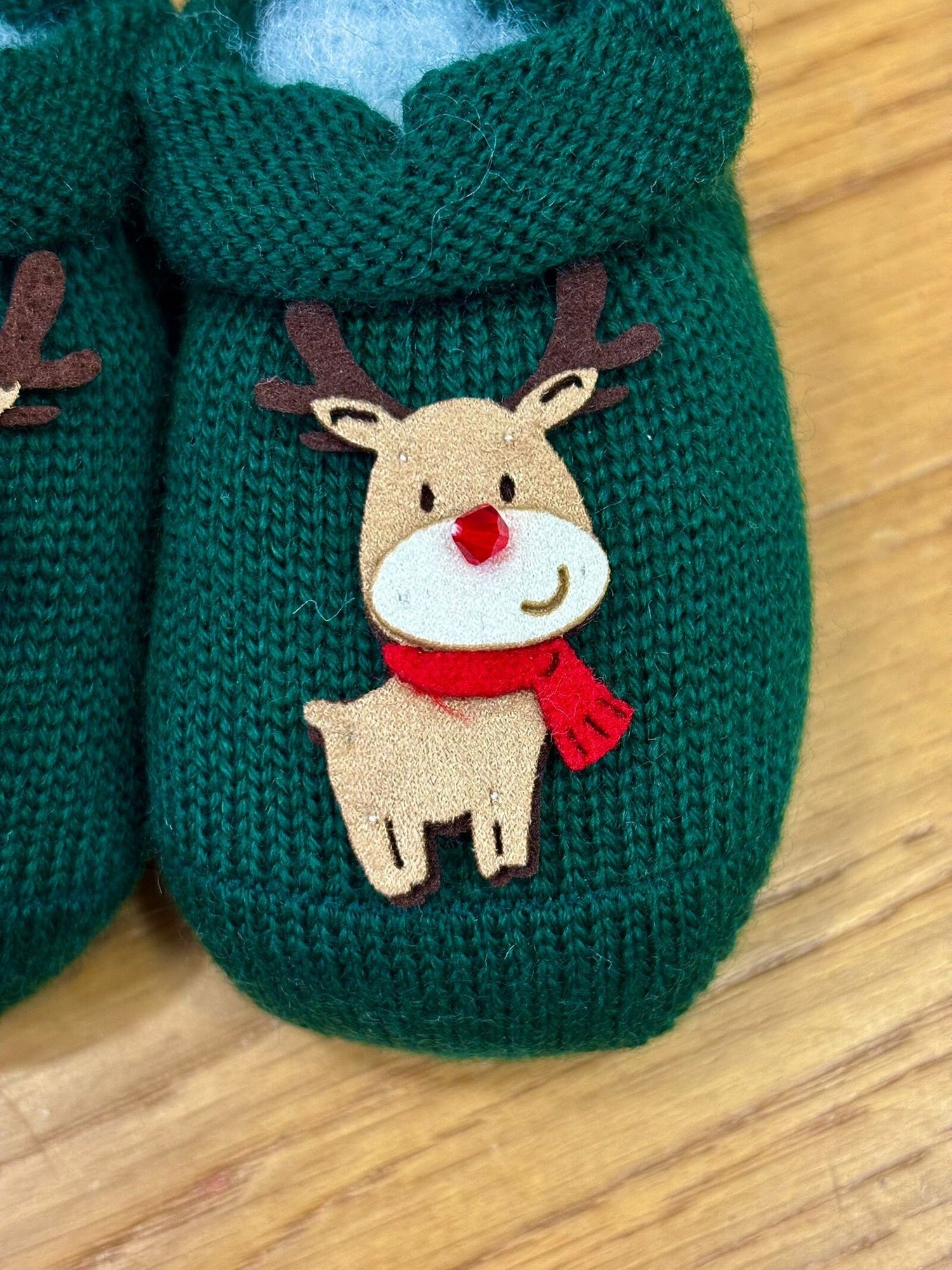 Scarpine neonato in lana con renna di Natale