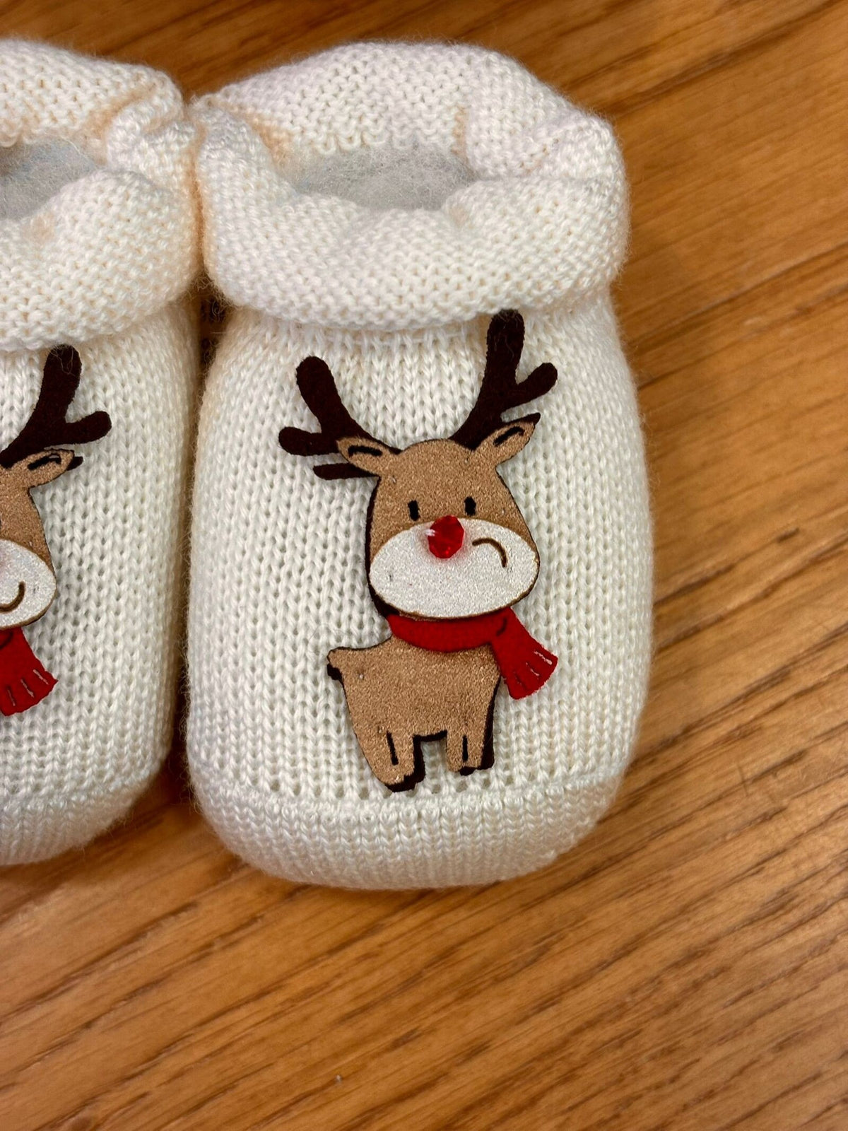 Scarpine neonato in lana con renna di Natale