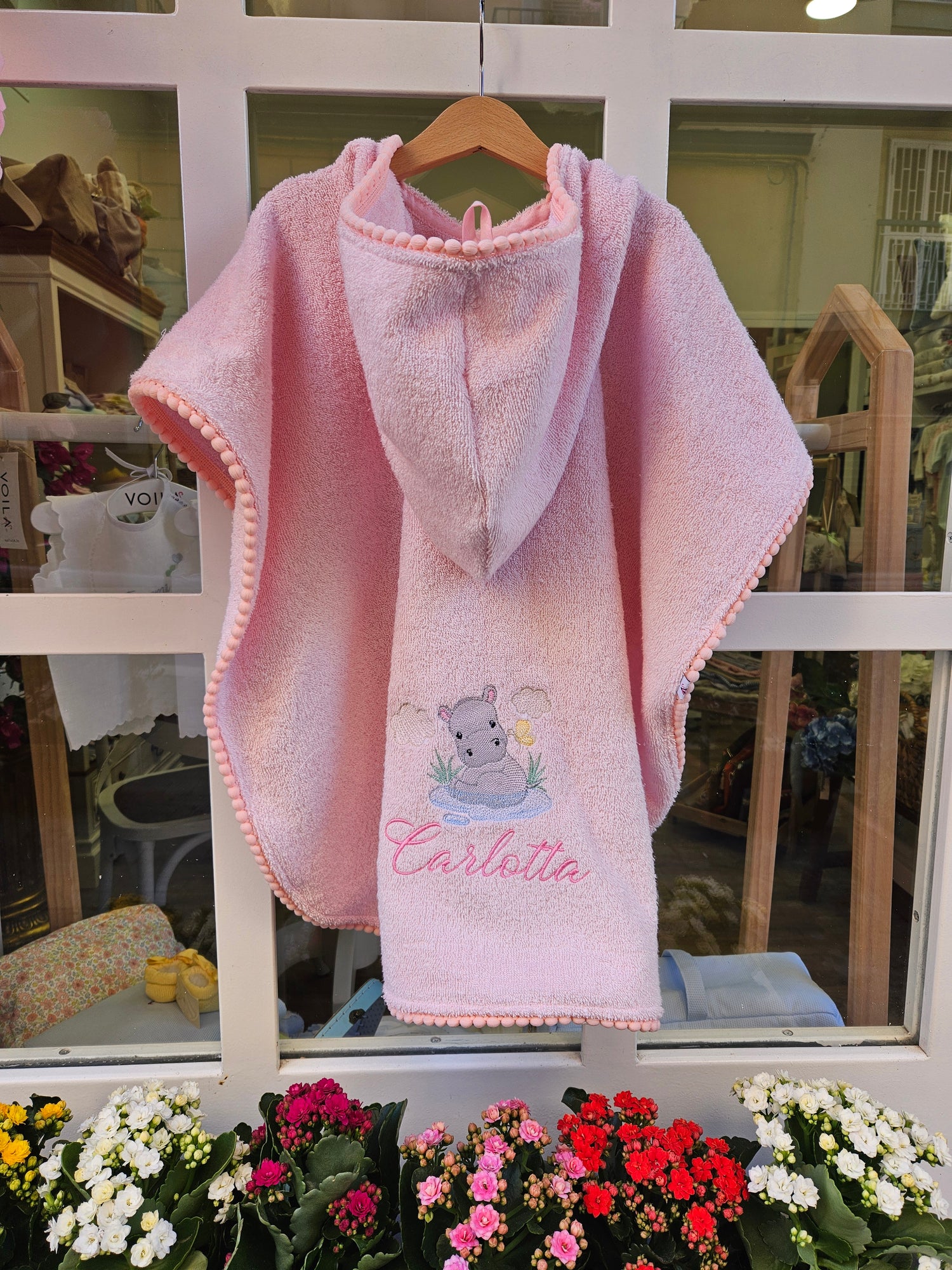 Accappatoio poncho in spugna di cotone e pon pon