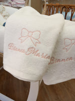 Coppia di asciugamani in spugna di cotone bianca