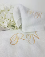 Coppia di asciugamani in spugna di cotone bianca