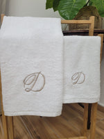 Coppia di asciugamani in spugna di cotone bianca