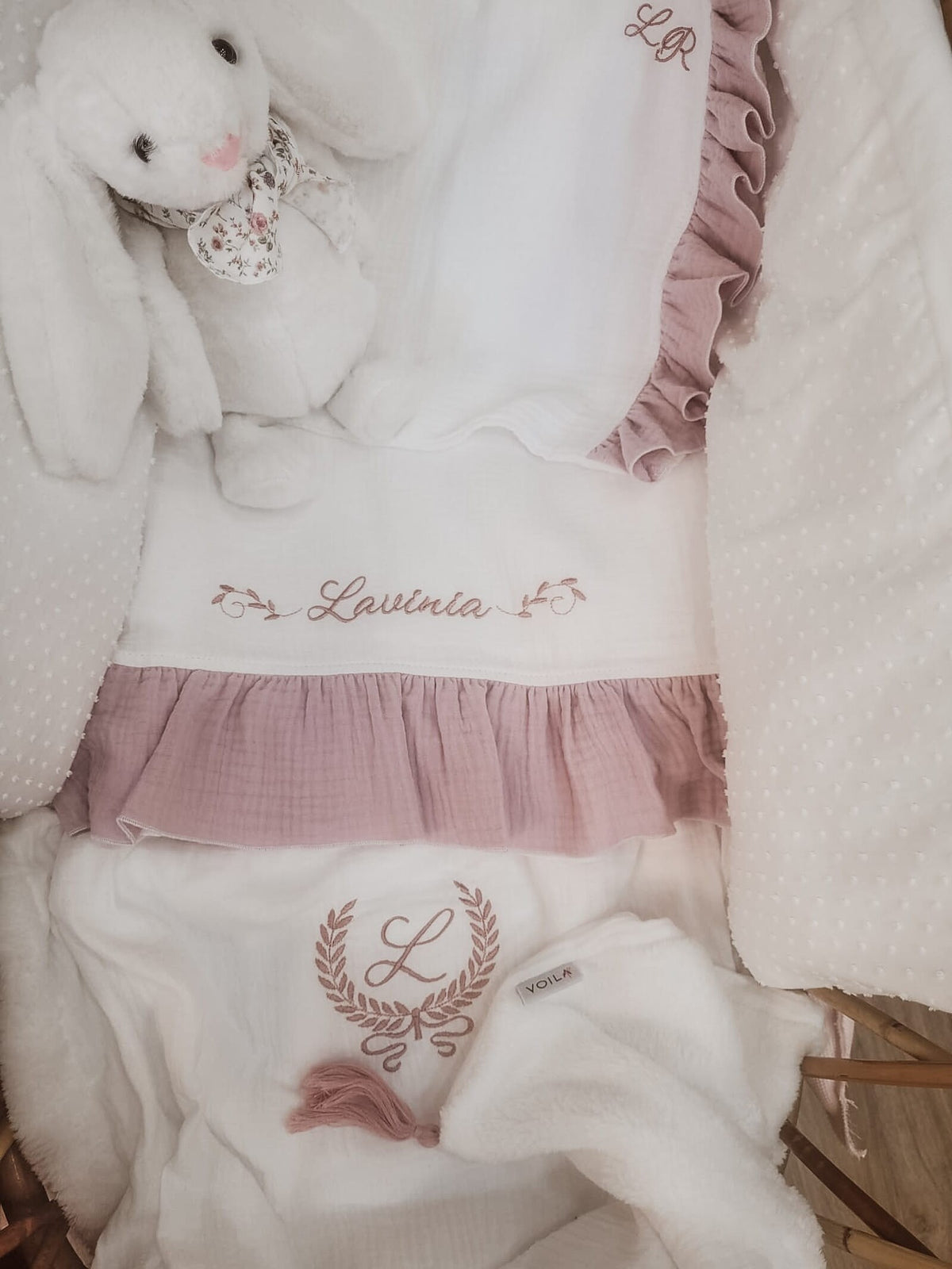 Copertina mussola e pile con nappe in merino