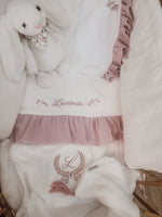 Copertina mussola e pile con nappe in merino