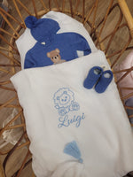 Copertina mussola e pile con nappe in merino