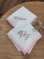 Coppia di quadrati di cotone con profilo colorato