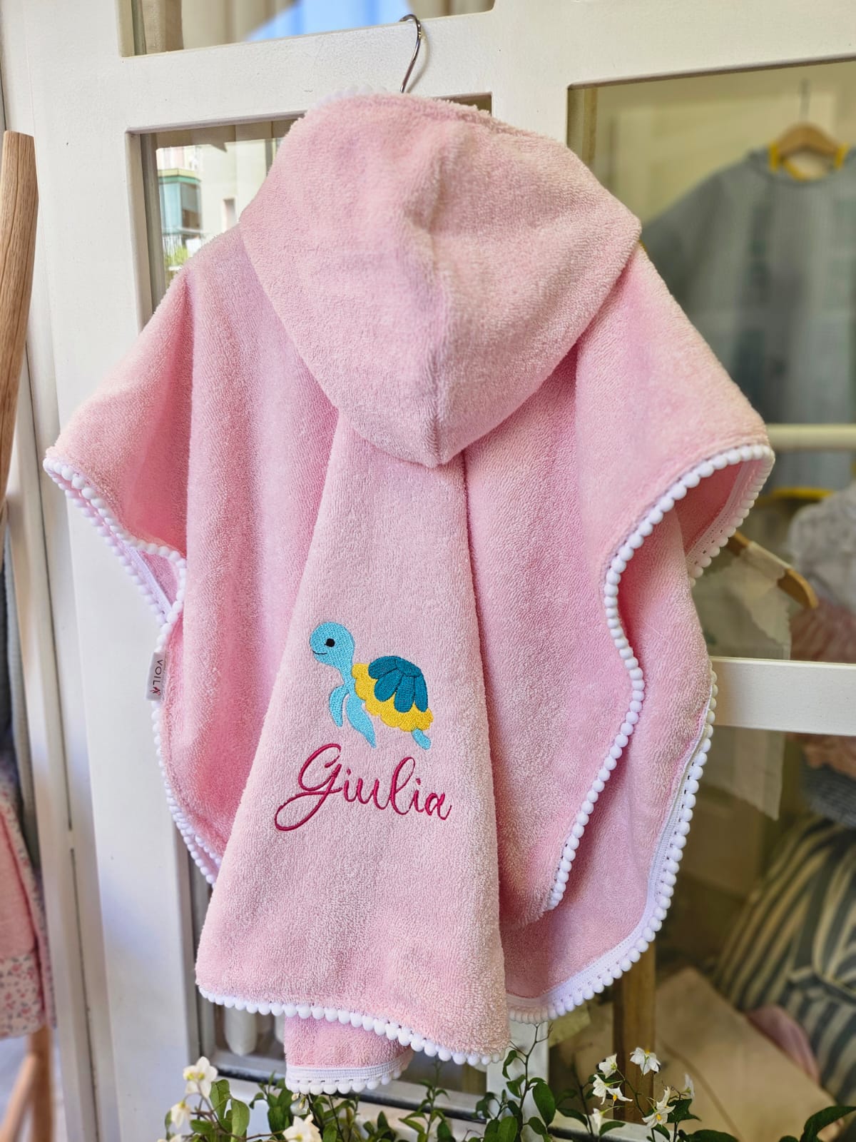 Accappatoio poncho in apone e pon pon