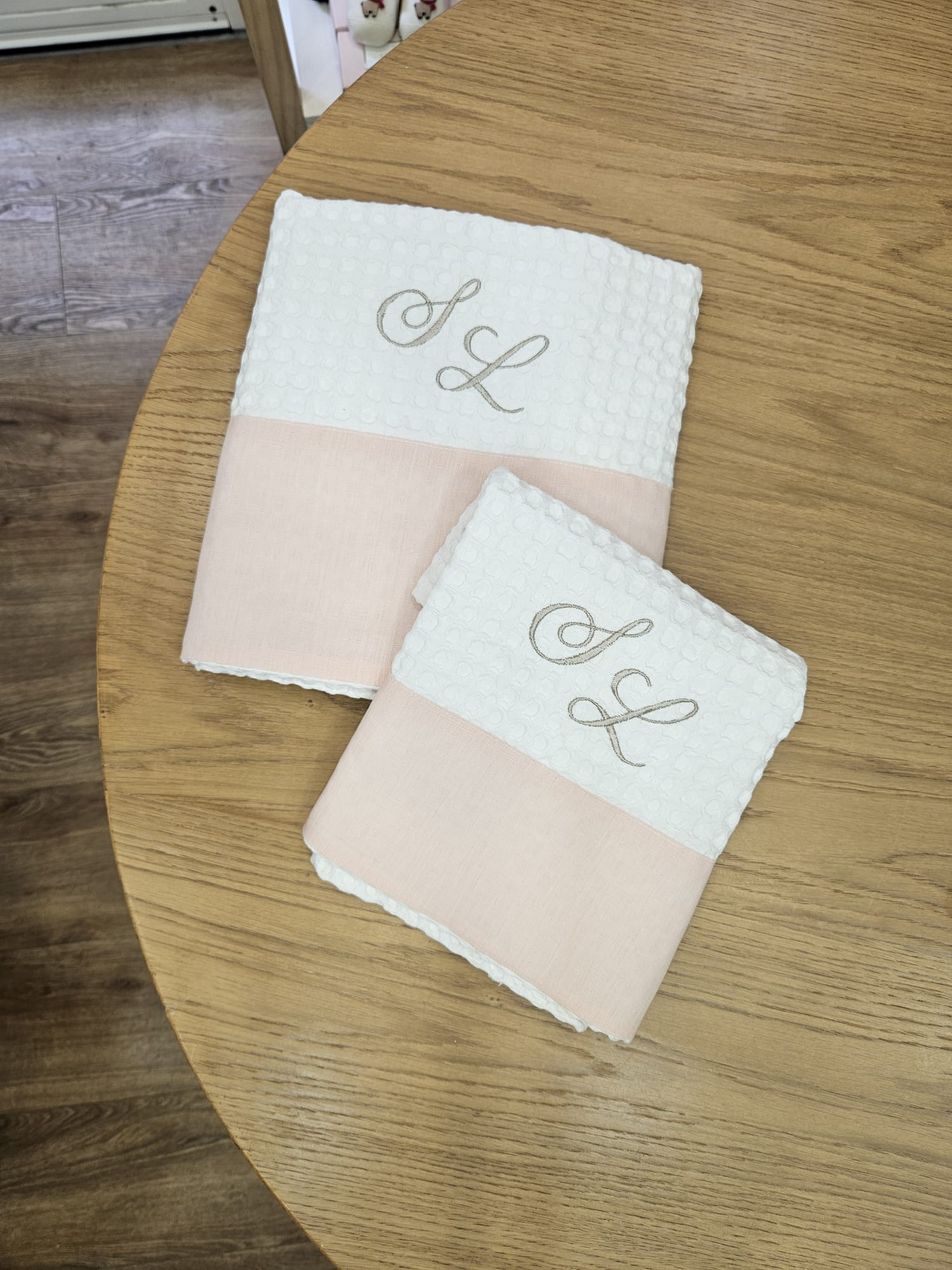 Coppia di asciugamani in apone con fascia in lino