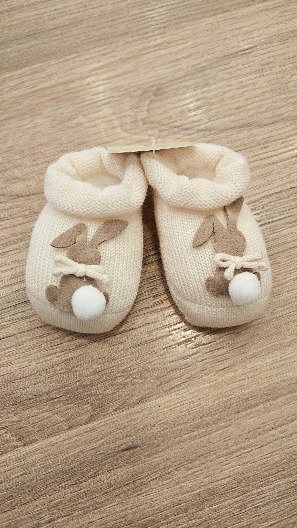 Scarpine neonato in lana con coniglietto